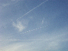 Airliners from Liverpool and Manchester airports play naughts and crosses in the sky with their vapour trails (starting game)