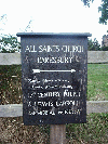 Sign pointing to All Saints Church Daresbury, Historic Church with many interesting features including 17th Century Pulpit, & Lewis Carroll Memorial Window