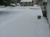 Unshovelled driveway with fresh snow