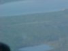 A blurred image of Deep River and the Ottawa River from the air
