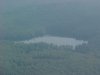 A small mountain lake on the Quebec side of the Ottawa River from the air
