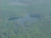 A small mountain lake on the Quebec side of the Ottawa River from the air