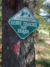 Sign for Leave Tracks not Trash and OFSC pointer