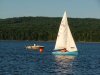 Deep River Yacht Club Committee Boat and a racing Sail Dinghy on the Ottawa River