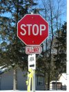 Allway Stop  sign with yellow ribbon