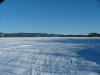 Frozen Ottawa River and ice fishing huts
