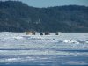 Frozen Ottawa River and ice fishing huts