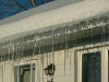 Winter icycles on roof gutters