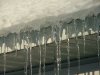 Winter icycles on roof gutters