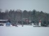 Deep River Marina and lighthouse under snow