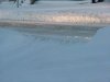 Snow-blocked driveway due to snow-plow
