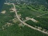 Aerial view: Highway 17, Ontario Hydro substation, Deep River golf course and Deep River Curling and Squash Club from the air