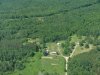 Aerial view: House in the woods