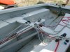 Albacore jib rigging for single handed. The reason for jib cleats near the main sheet is that I can release the jib without having to let go of the mainsheet: as letting go of the mainsheet while setting the jib is an easy cause of turtling the boat. Photo is a bit misleading for the mainsheet rigging as the cleats are normally pointing towards the back/stern of the boat when ready to sail. Port and starboard jib sheets are now different colours (blue and red). Centerboard has a CL257 Auto-release Racing Mini Clamcleat with dinghy braid, as well as a backup Clamcleat with Shockcord