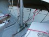 Jib Halyard / wire-Rope Halyard on the port-side, and rigged main halyard on the starboard side using CL218MK1 Port Side Entry Clamcleat.  Main halyard block has extra shackle so halyard does not wear down the CL218MK1 Port Side Entry Clamcleat when raising the Main sail