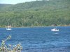 Ontario Provincial Police (OPP) boat on the Ottawa River and windsurfer