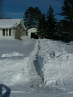 Dugout path in driveway snowscape