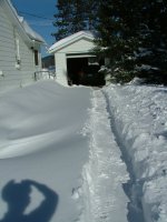 Dugout path in driveway snowscape