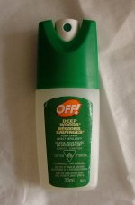 small pocket-size spray bottle of DEET insect repellent