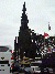 The Scott Monument spoils the view of multiple traditional Edinburgh buses