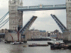Small Tall ship going under the Tower Bridge