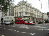 Open top Tour Bus along Kensington High Street
