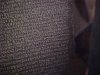 Blurred images of the Greek script on the Rosetta Stone