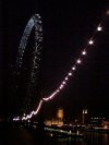 The London Eye from the south bank of the Thames at night