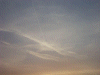 Jet vapour trail and wispy skyscape