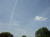 Jet vapour trails play naughts and crosses in the sky