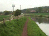 Heron Stalking fish on the canal and NSF Tower in the distance