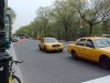 New York Taxis driving by