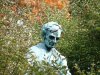 Statue of Abraham Lincoln, reading a book on a Horse munching grass